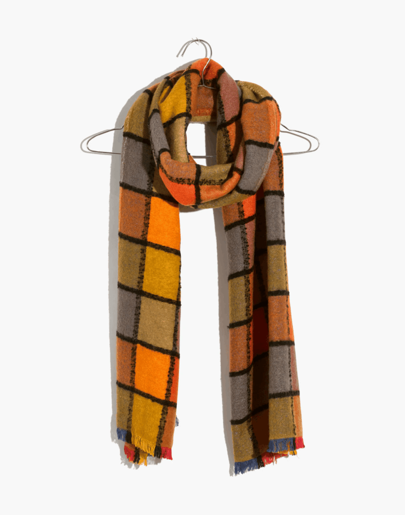 A yellow and brown plaid scarf 