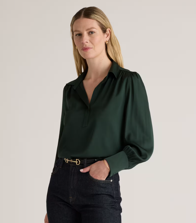 Model wearing forest green blouse.