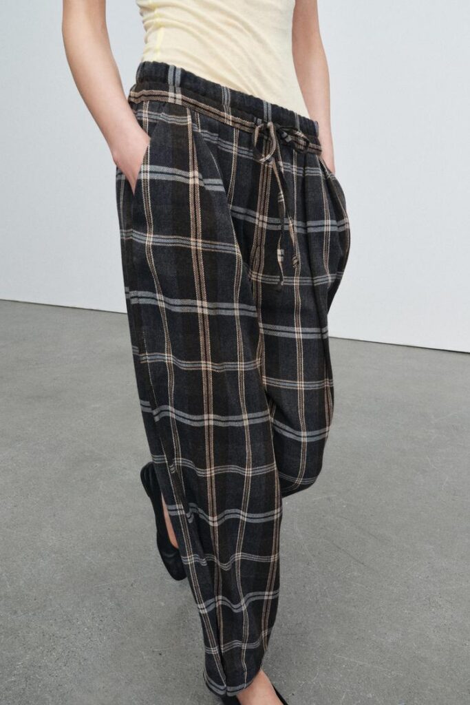 Plaid pants styled in a casual outfit in Albuquerque