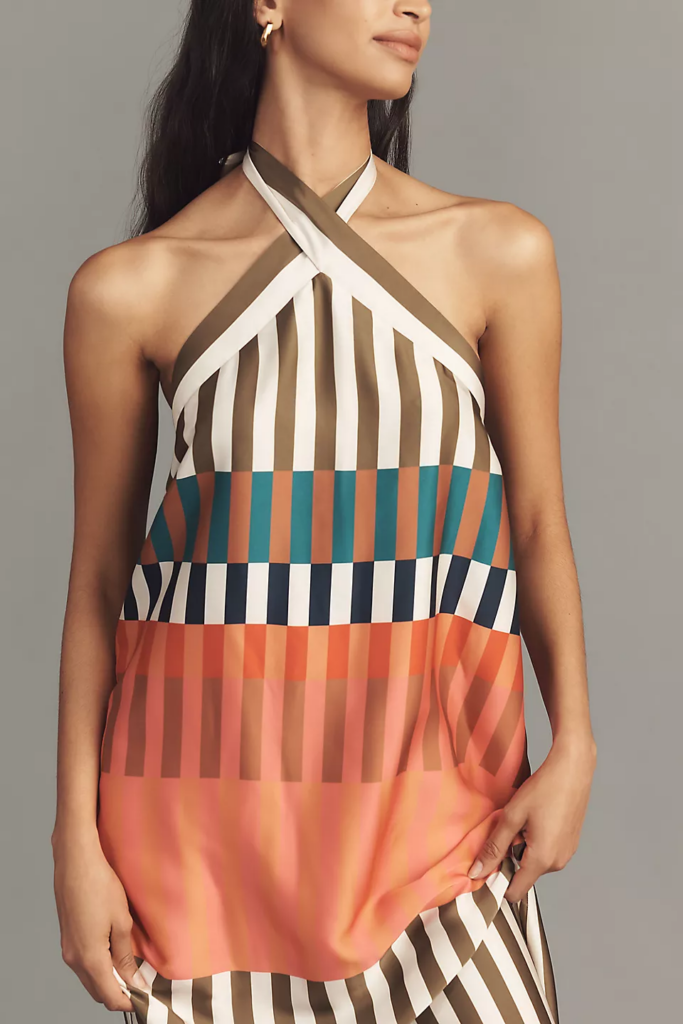 Bold striped dress in a colorful pattern for spring outfit style.