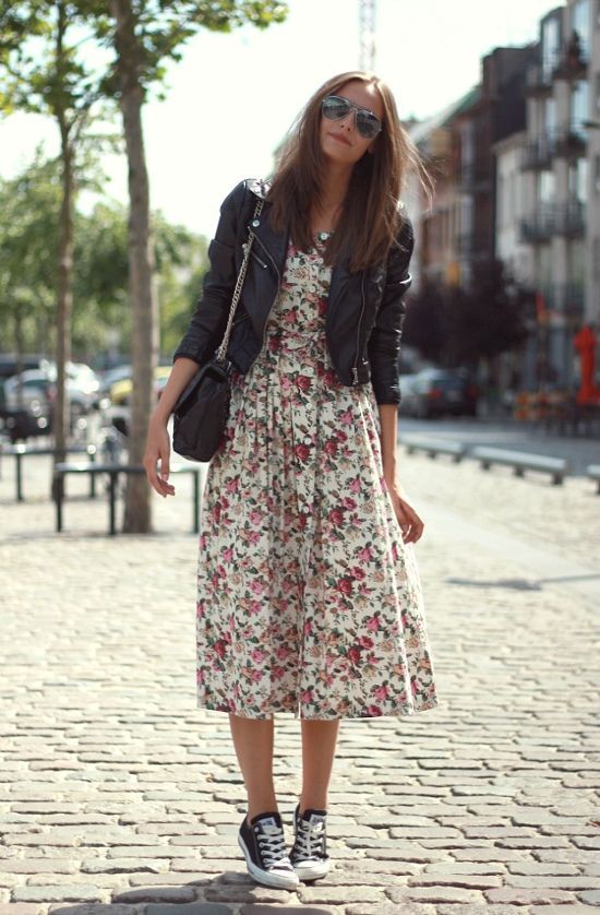 A black jacket and shoes add interest to a floral dress.